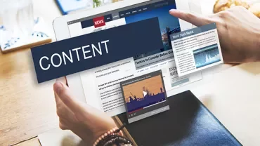 Tablet displaying news and stock market updates with content overlay.