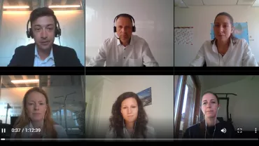 Video call with six people wearing headsets in a virtual meeting.