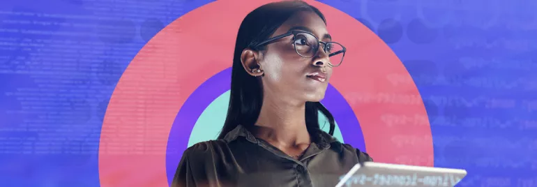 Person holding a tablet with a colorful digital background.