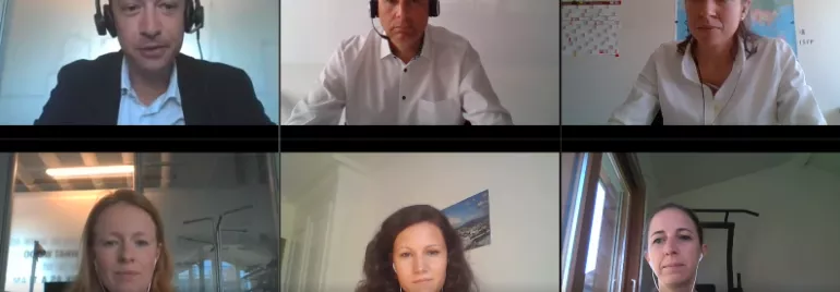 Video call with six people wearing headsets in a virtual meeting.