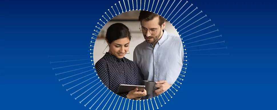 Two people looking at a tablet, surrounded by a circular graphic.