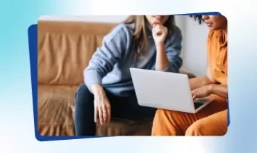 Promotional tile from Talent Trends 2026 featuring two women pointing at a computer screen