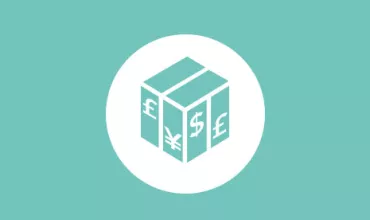 Cube avec symboles monétaires : dollar, livre, yen et euro.
