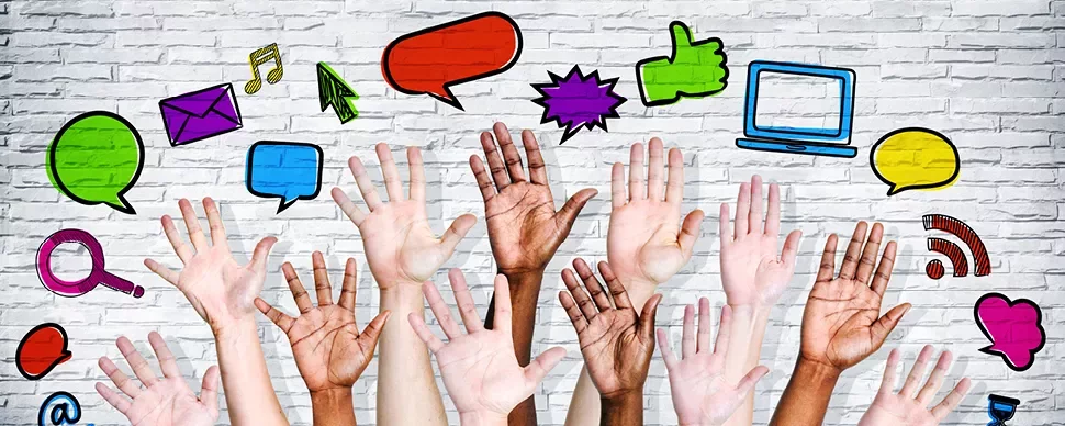 Hands reaching up with various social media icons above on a brick background.