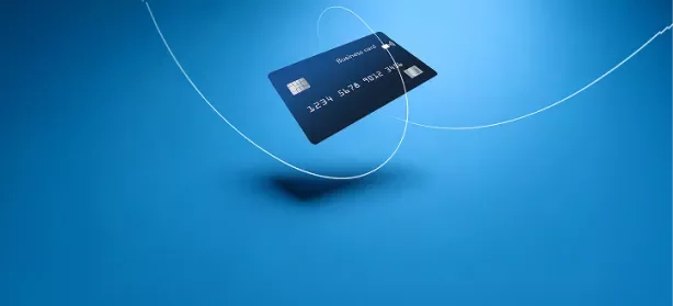 A credit card in a blue gradient background